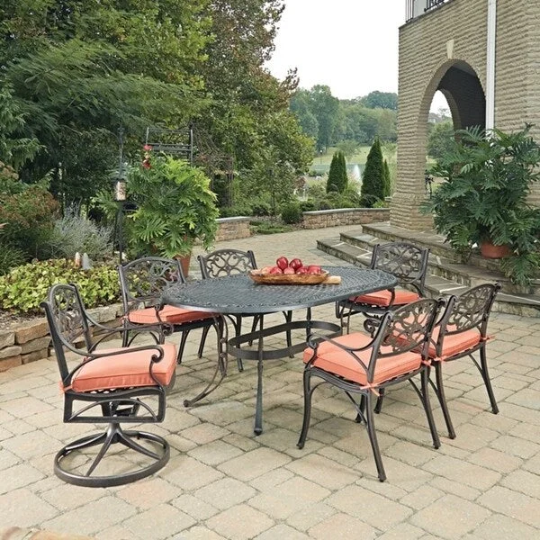 Biscayne Rust Bronze Oval 7 Pc Outdoor Dining Table with 4 Arm Chairs & 2 Swivel Rocking Chairs with Cushions by Home Styles