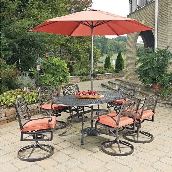 Biscayne Rust Bronze Oval 9 Pc Outdoor Dining Table, 6 Swivel Rocking Chairs with Cushions & Umbrella with Base by Home Styles