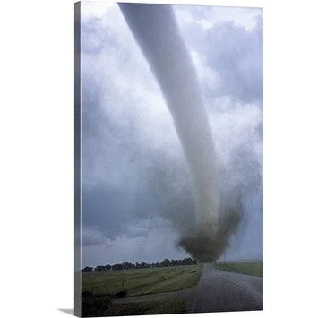 Premium Thick-Wrap Canvas entitled A violent tornado blocks passage down a road near Manchester South Dakota