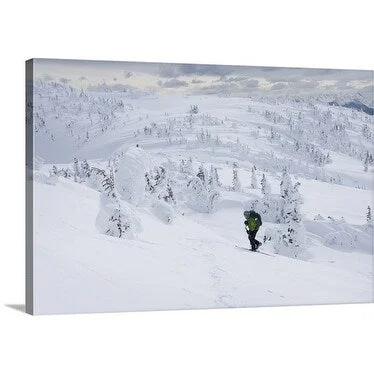 Premium Thick-Wrap Canvas entitled Backcountry telemark skier skinning up to the summit of Brothers Mountain, Canada