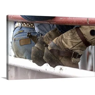 Premium Thick-Wrap Canvas entitled Closeup of a bull riders cowboy boots with spurs at rodeo. Arcadia, Florida, USA