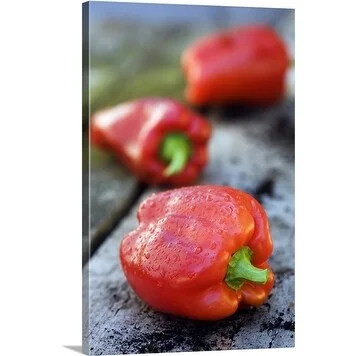 Premium Thick-Wrap Canvas entitled Picked Sweet Peppers (Capsicum) lying on wooden surface